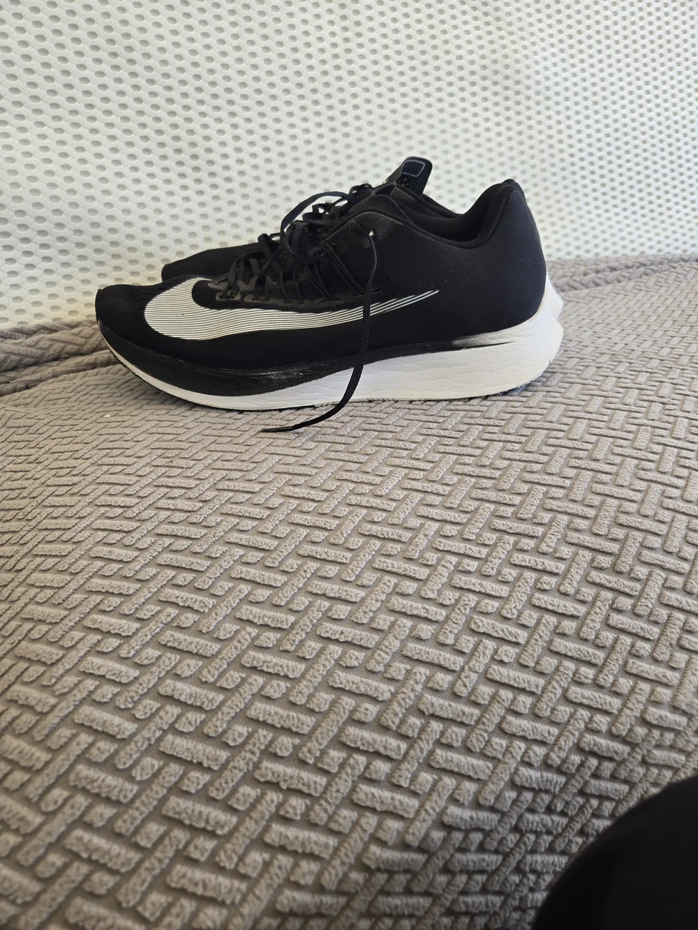 Nike Men’s Black Running Shoes with White Swoosh